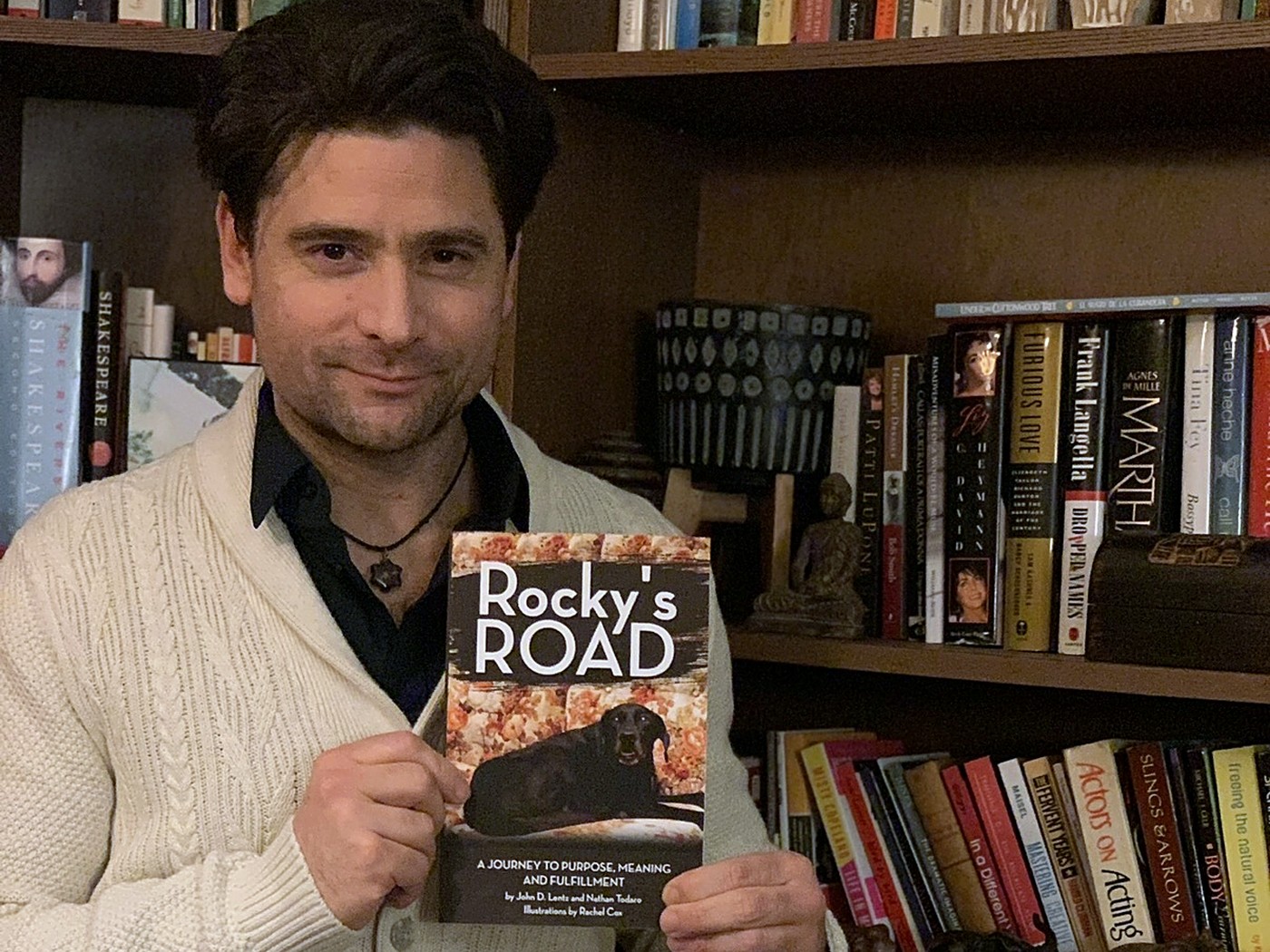 Nathan Todaro holding Rocky's Road